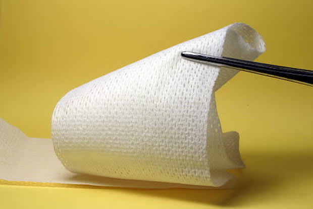 a bandage on a yellow background