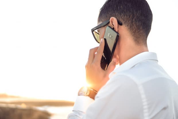 a man taking a phone call