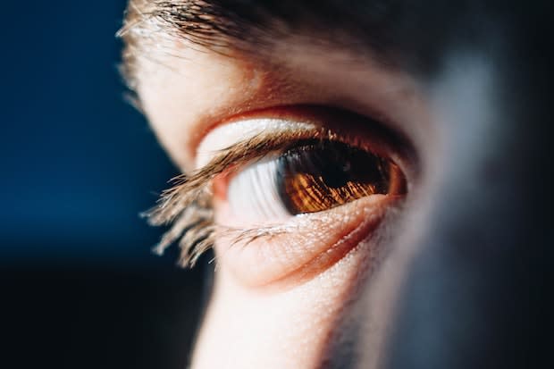 a close up of a person’s eye