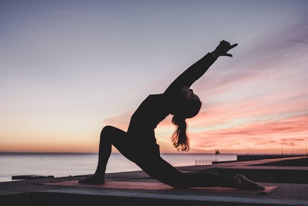 a woman doing yoga