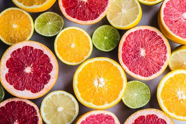 an assortment of citrus fruits