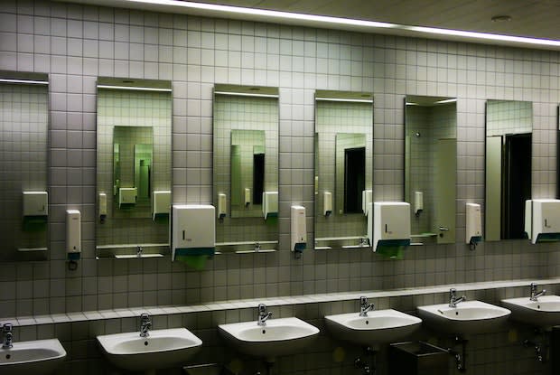 a line of sinks in a public restroom