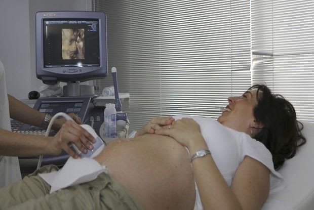 a woman getting an ultrasound