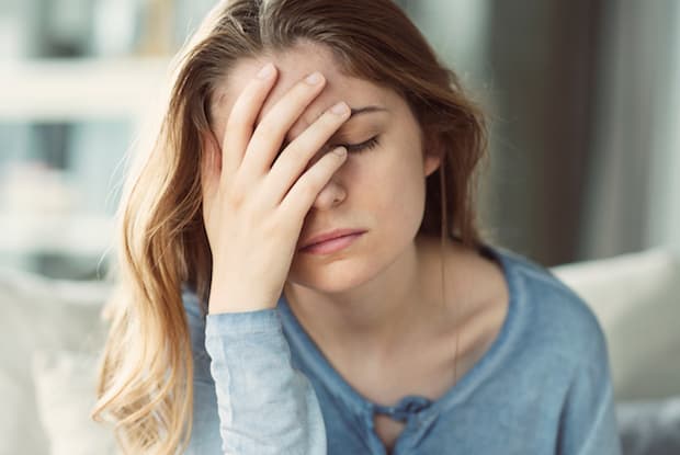 a woman looking distressed