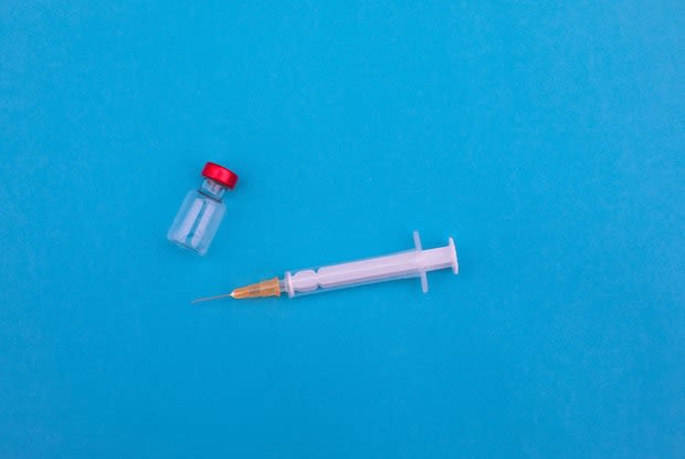 a needle with an empty vial