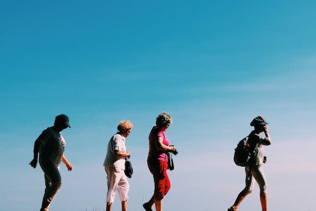 older women walking together