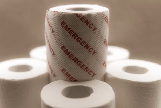 toilet paper with the word ‘emergency’ written on one roll