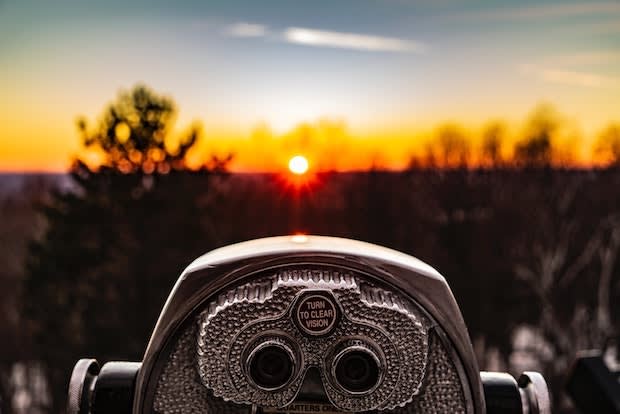 a viewfinder at the top of a hill