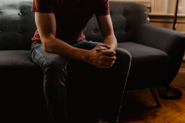 a man sitting on a couch