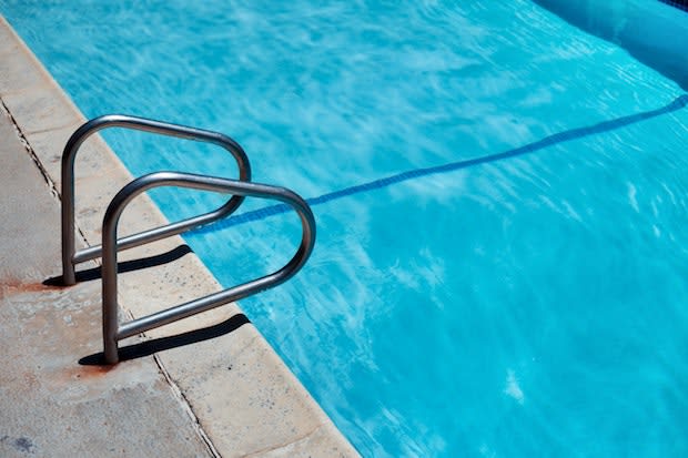 an entrance to a pool