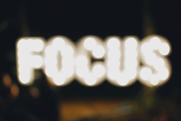 The word focus written in lights, out of focus