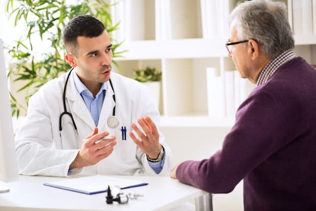 a doctor talking to a patient