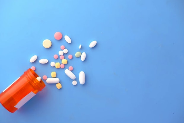 pills on a blue background