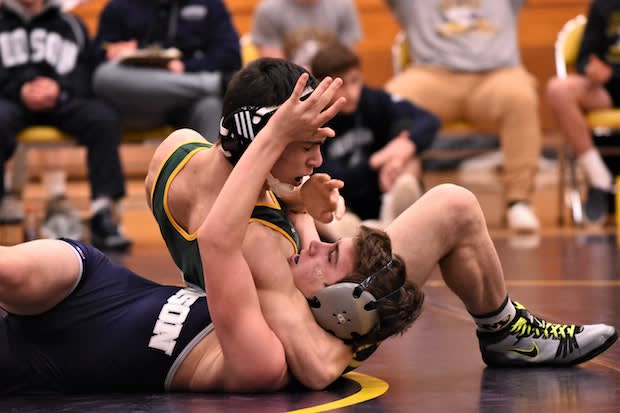 two men competing in a wrestling match