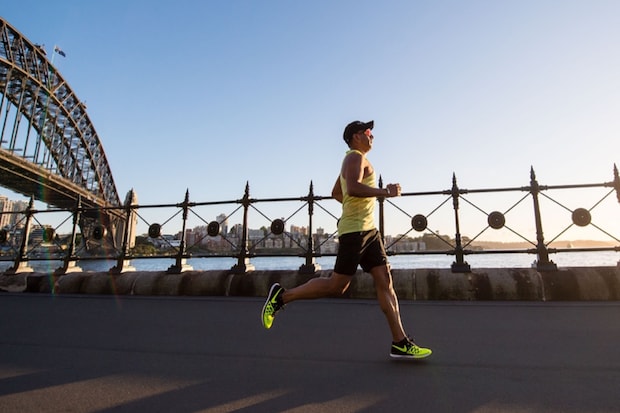 a person jogging by the water