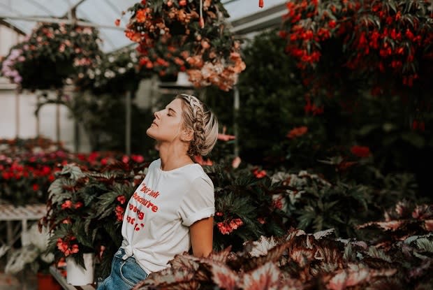 a woman in a garden