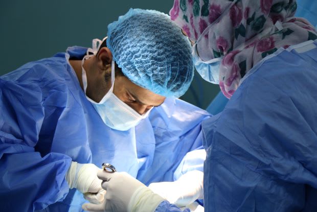 surgeons performing a procedure