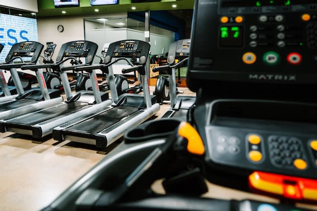 a set of treadmills at a gym