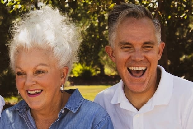 an older couple laughing together