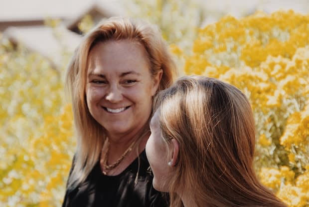 two women talking to each other