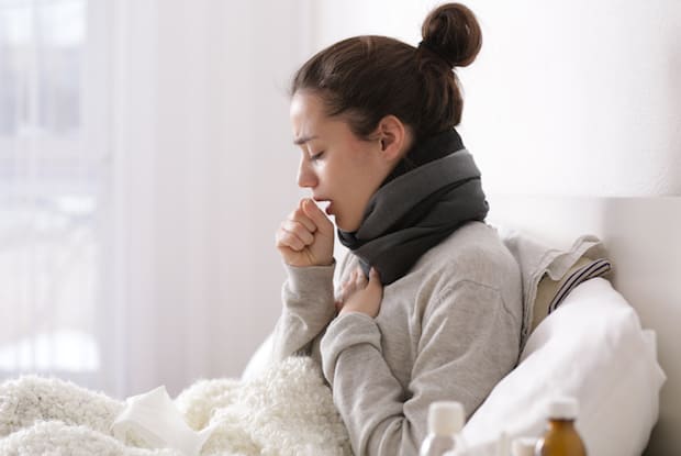 a woman with a cold