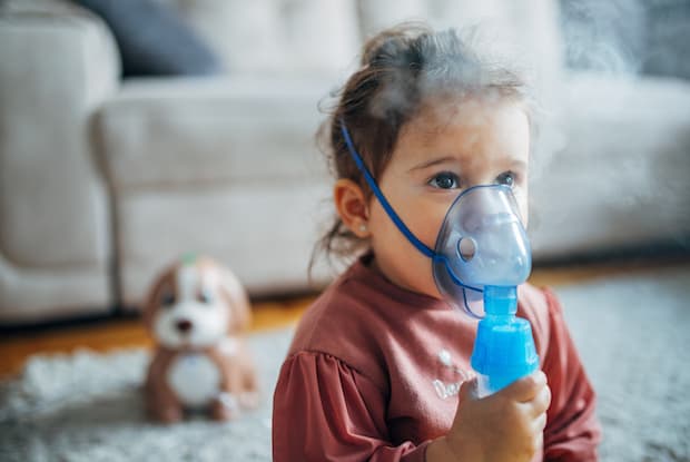 a child having a breathing treatment