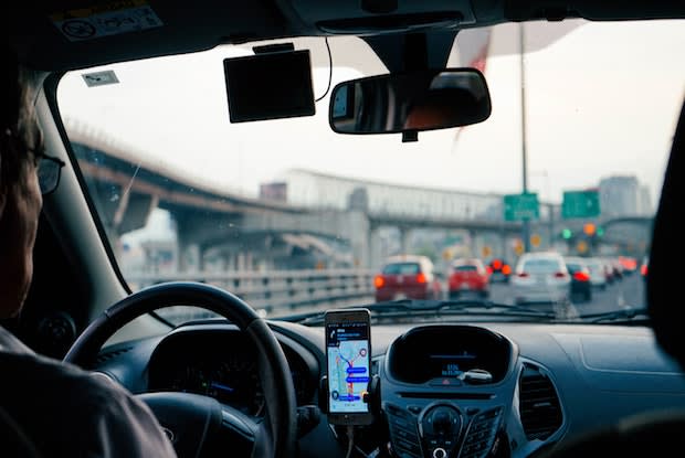 an uber driver in moderate traffic