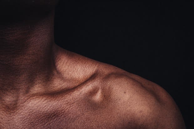 a person’s neck and collar bone