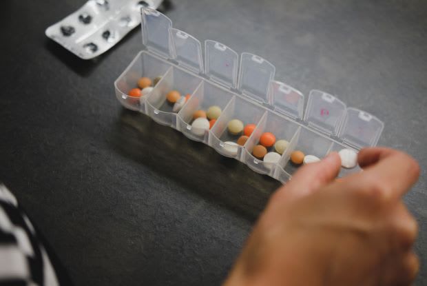 different medications in a pill organizer