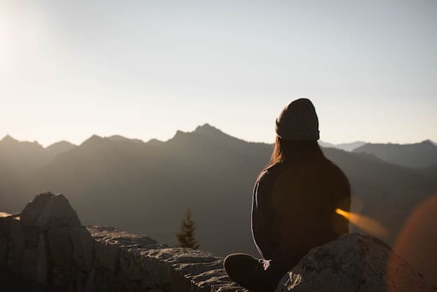 a woman sitting by herself