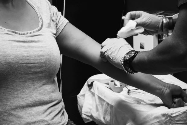 a woman getting a blood test