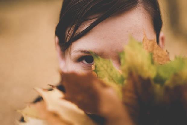 a face and a leaf