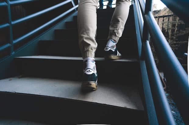 a man running up a staircase