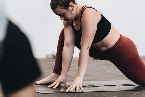 a woman practicing yoga