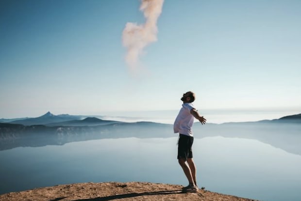 a man with his arms outstretched