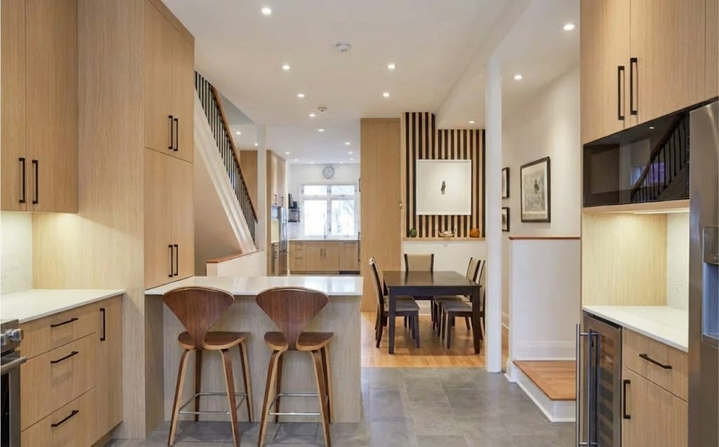 Warm Minimalist Interior — open concept kitchen remodel featuring clean lines in Washington DC
