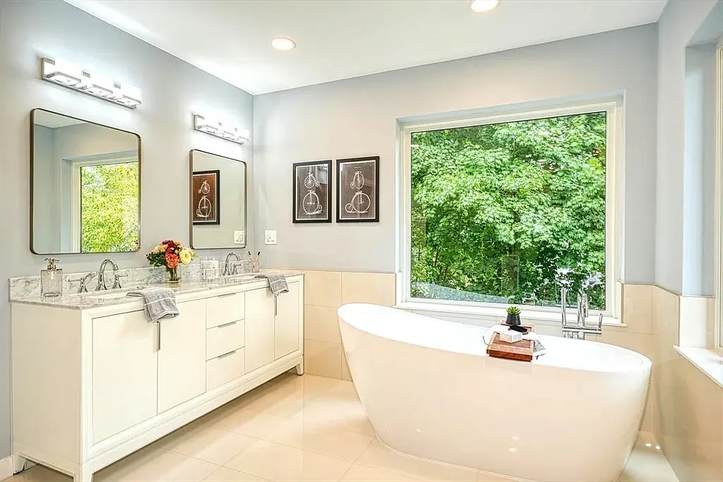 Modern Minimalist Oasis bathroom remodel with streamlined glass shower in Washington DC