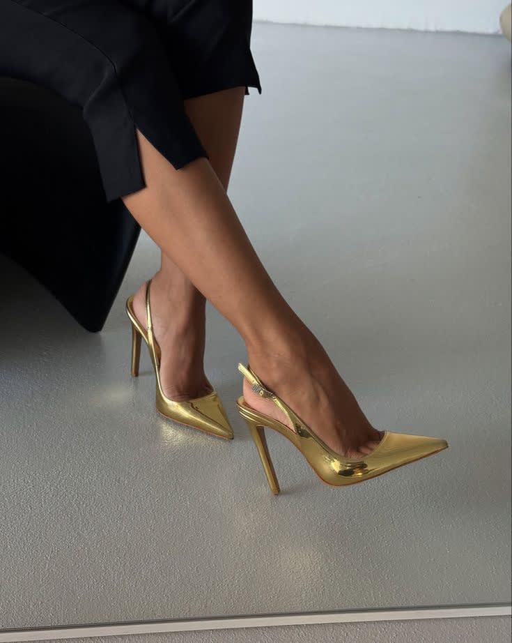 A pair of shoes on a marble surface
