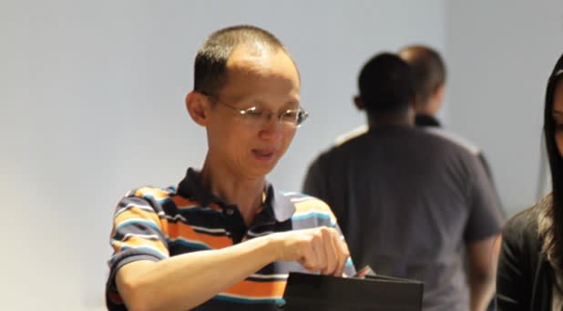 Asian employees with ice cream at a company event