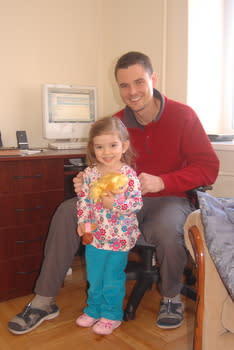 Posing with Daddy and her new dolly, our big 3-year-old!
