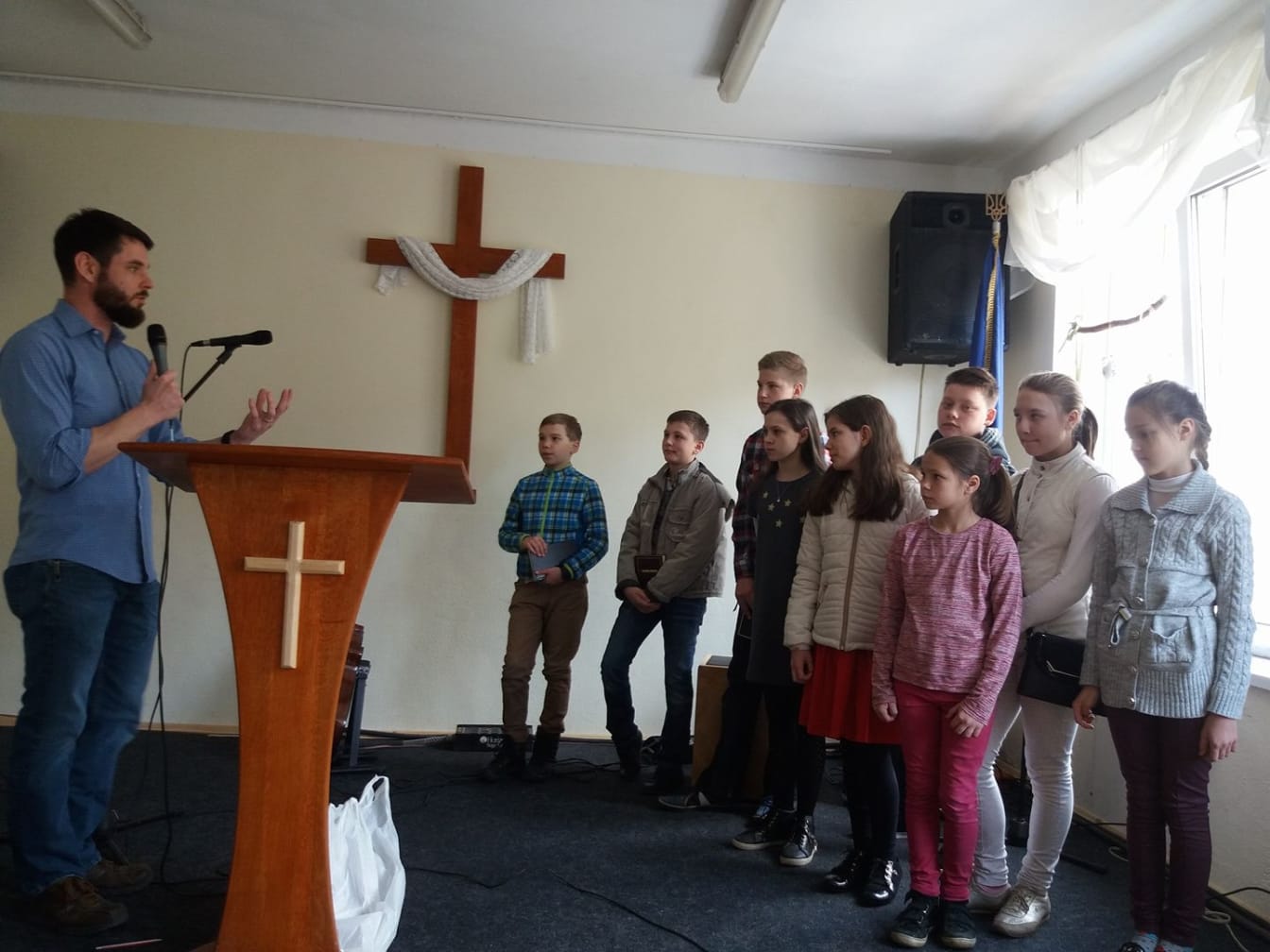 The class receives three challenges in front of the congregation on our first day.
