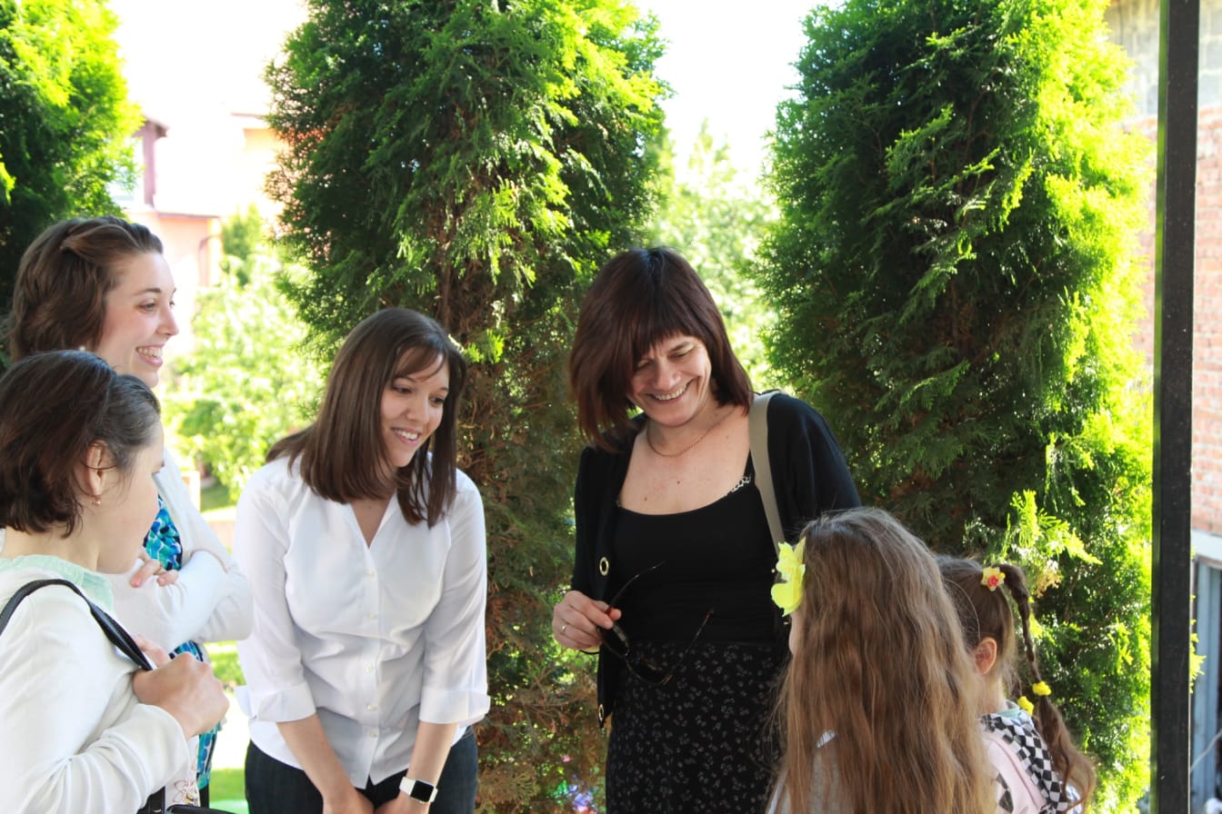 Greeting a couple of the younger attendees