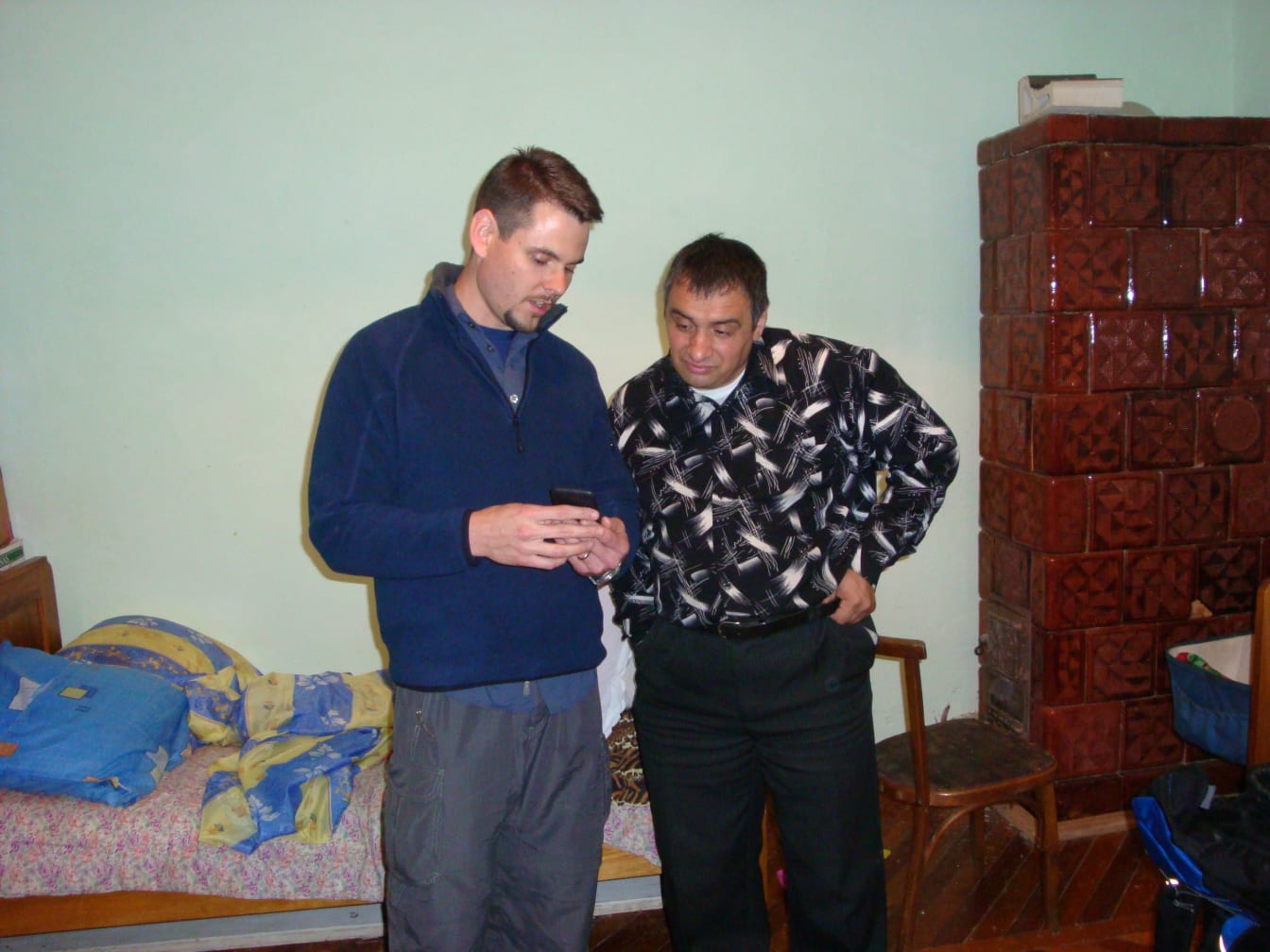 Looking at pictures with Father Stepan at his home in Khashchovanya.