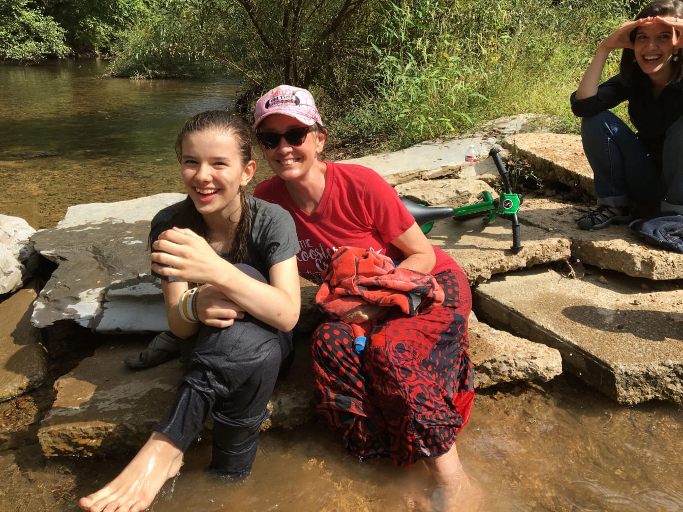 During our stop at Cane Creek, the kids had fun playing in creek with Debi!