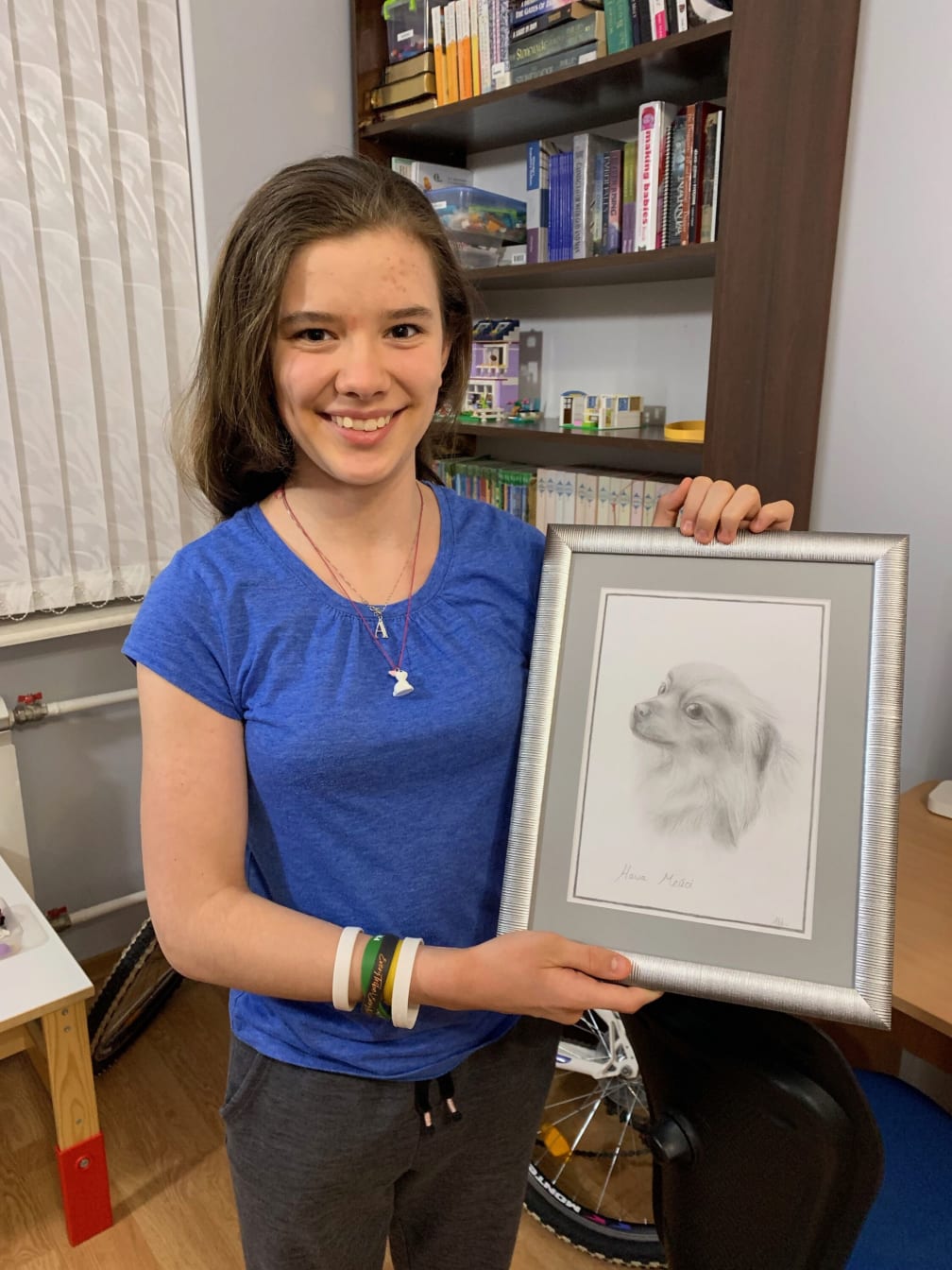 Our family has recently adopted a new dog, whom we&rsquo;ve named Macie. Abby did a nice sketch of Macie and had it framed.