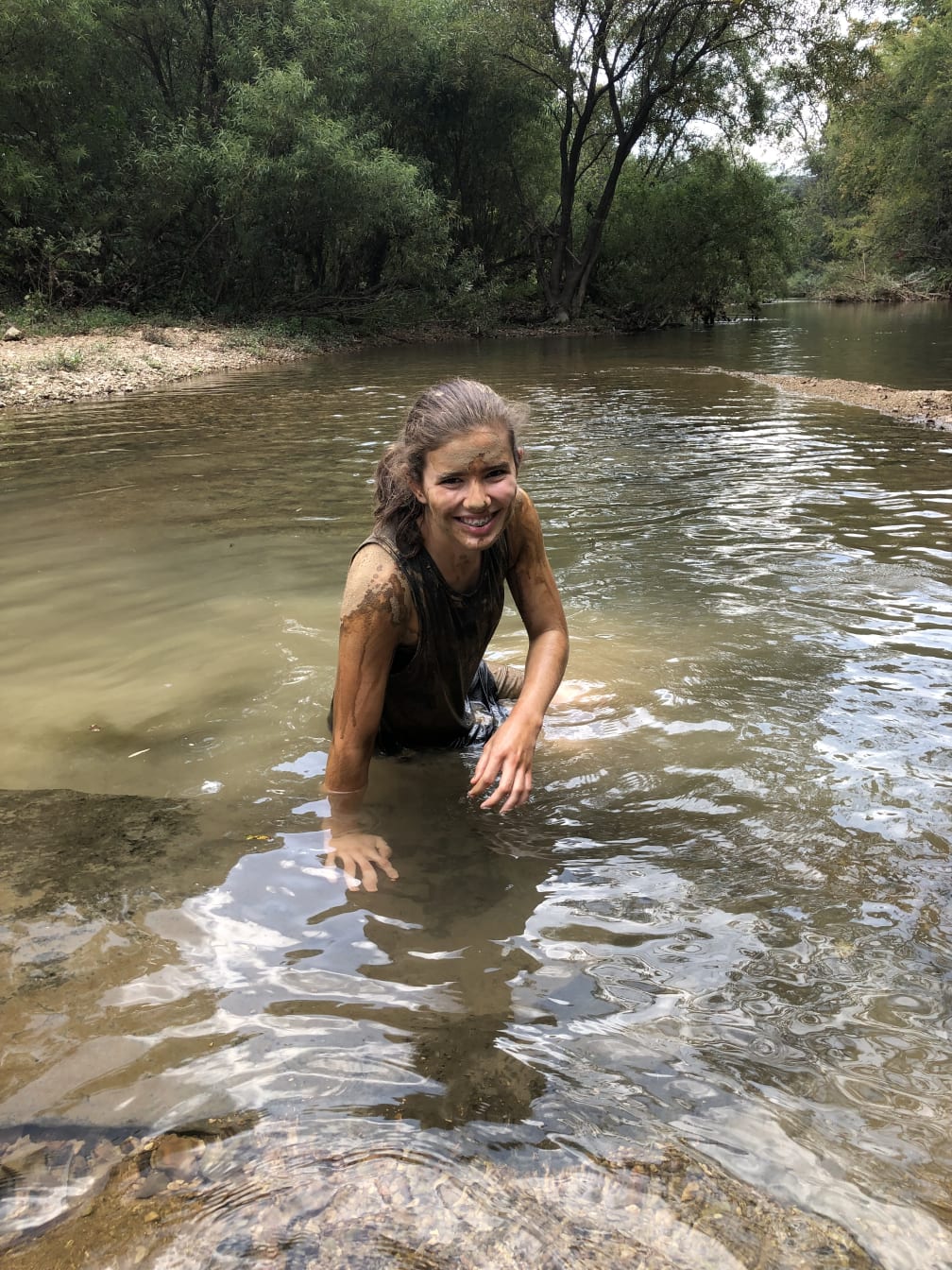 Ever had a mud fight in a cave? Me neither, but I’ve heard it’s fun. Abby washes up in the creek afterward.