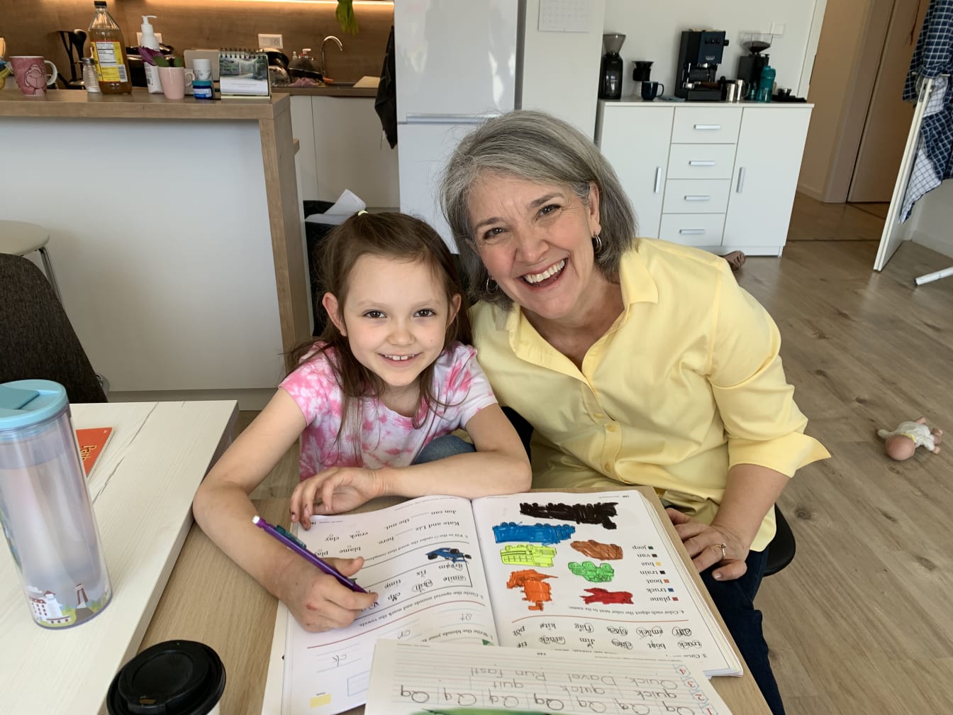 Baba has been helping Kathryn with her school work.