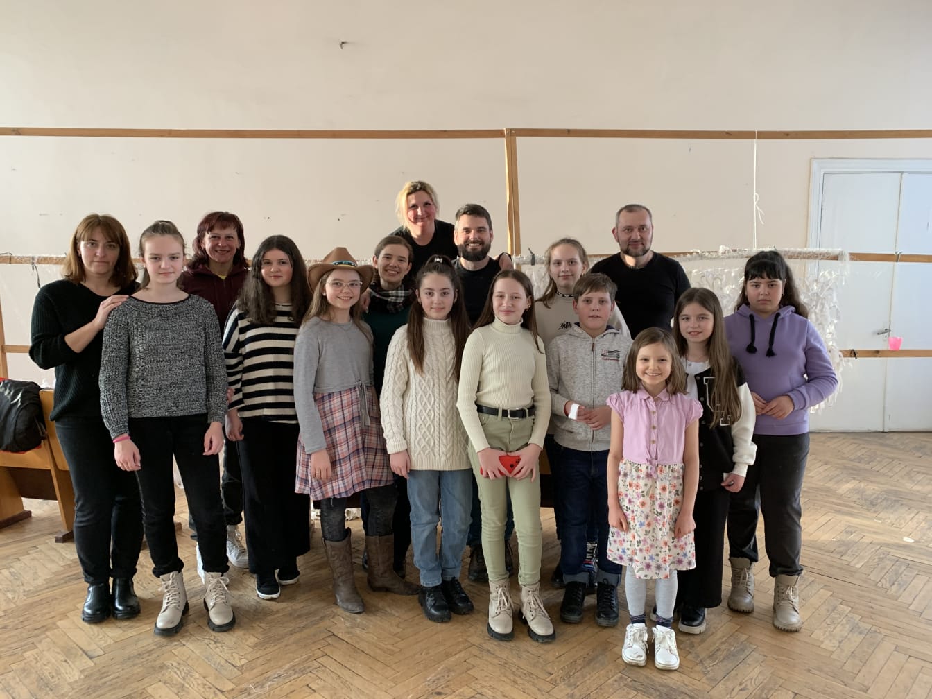 Our visit to Radekhiv coincided with a group of kids from a local school. Everyone pitched in to help with the camo netting.