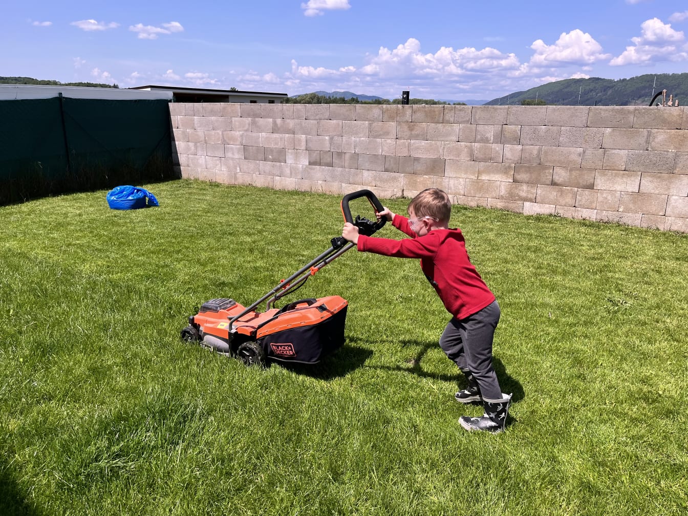 Our house in Mojš was the first place we’ve ever lived that had a yard. Great time for David to learn a bit about mowing the grass!
