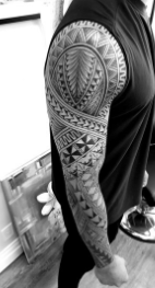 Black Fijian full arm tattoo